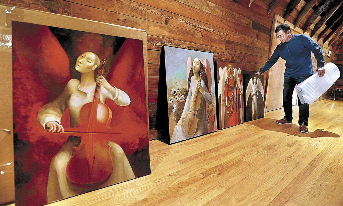 alexander anufriev preparing an exhibition